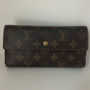 Louise Vuitton Monogram Canvas Porte International Wallet